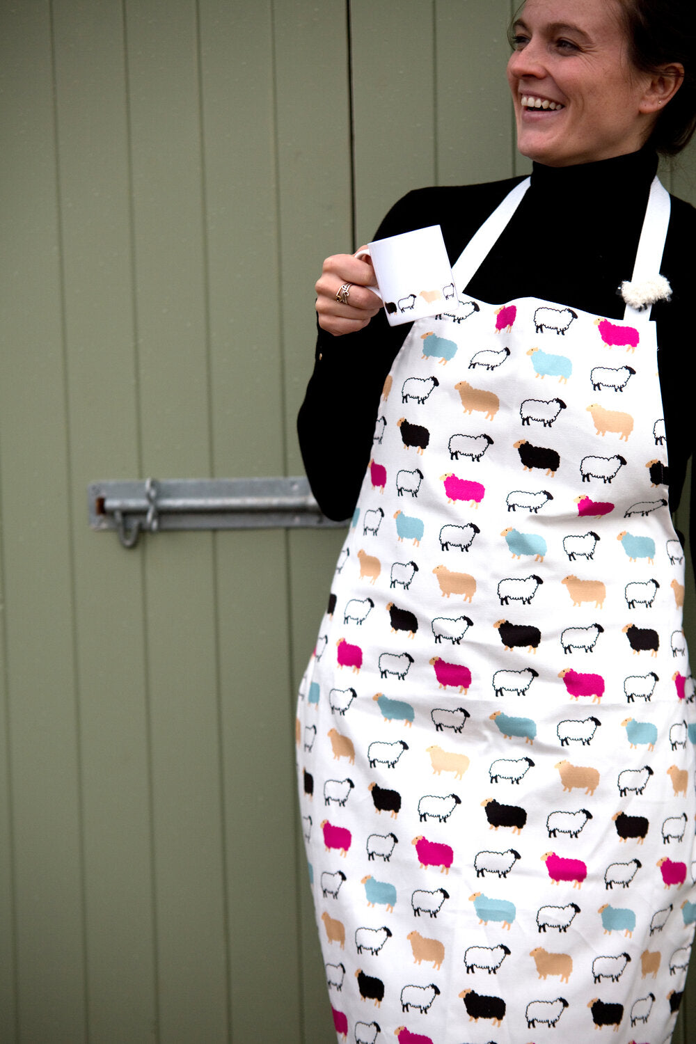 http://scottishcreations.com/cdn/shop/files/woolly-ewe-apron-hairy-coo-scottish-creations.jpg?v=1700834246&width=2048